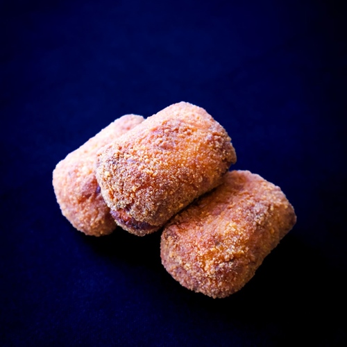 Parmesan croquettes, harissa aioli V
