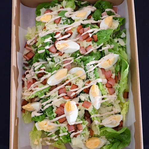 Box salad , feed's 8-10 . Ceaser Salad